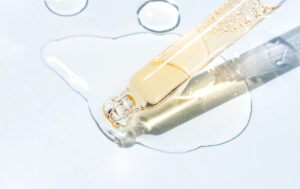 glass dropper with liquid biopsy sample - breast cancer - biomark diagnostics